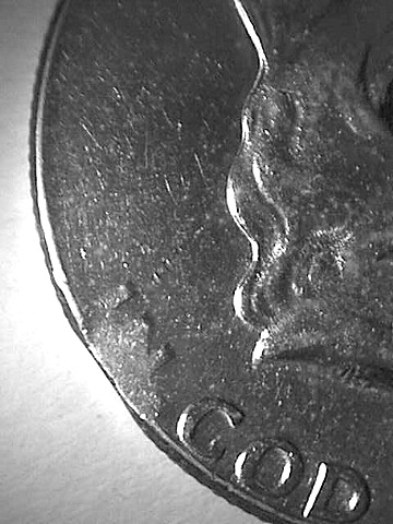 1957-Franklin,-Very-Small-Die-Clip?