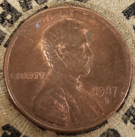 1987-Denver-Mint-Lincoln-Cent-With-A-Line-Through-God-We-Trust