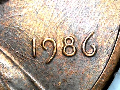 What's-Up-With-This-Penny-1986?-So-Many-Scrathes