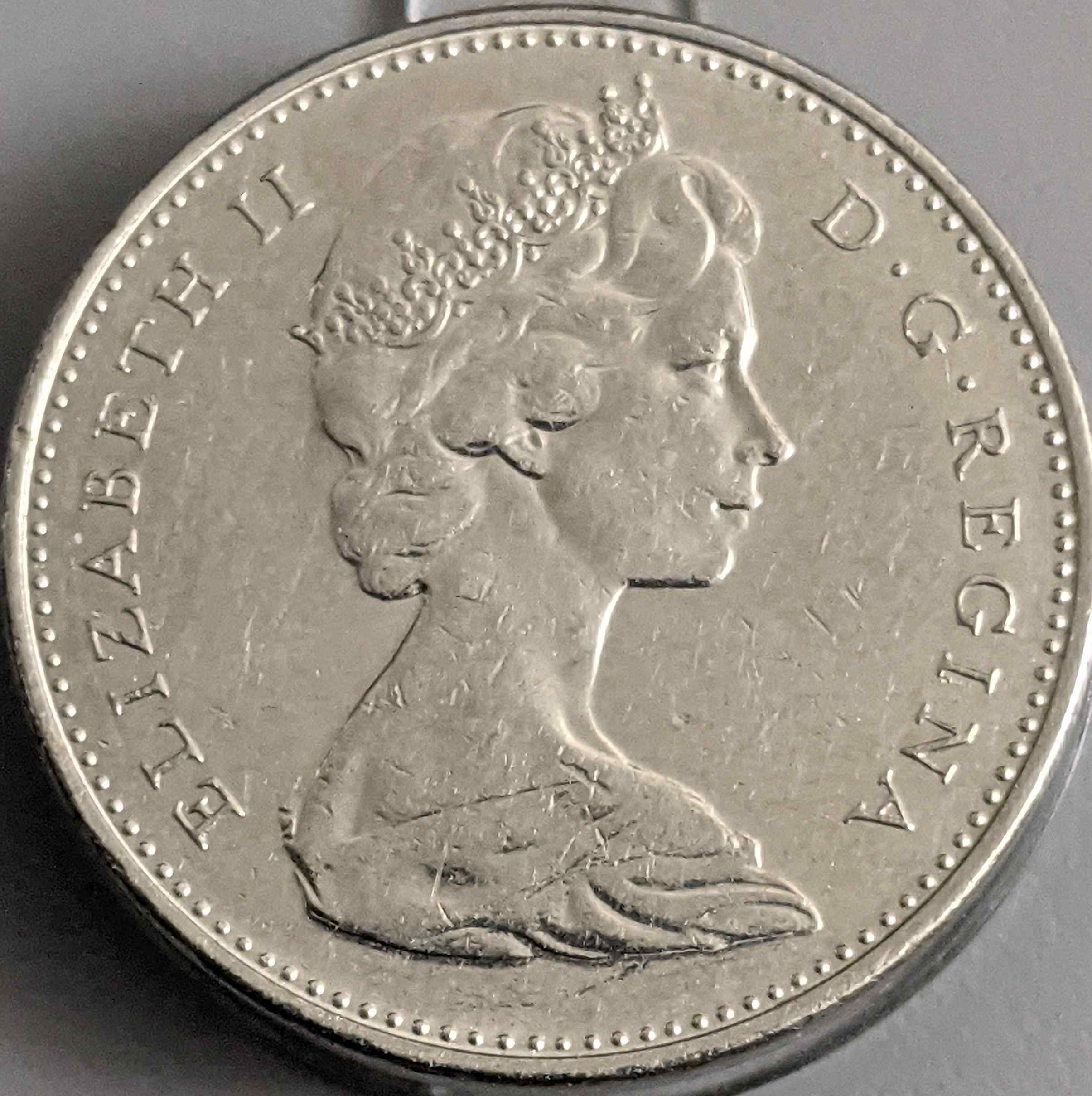 This-1977-Nickel-Is-Low-7-?-Thanks-For-Answers