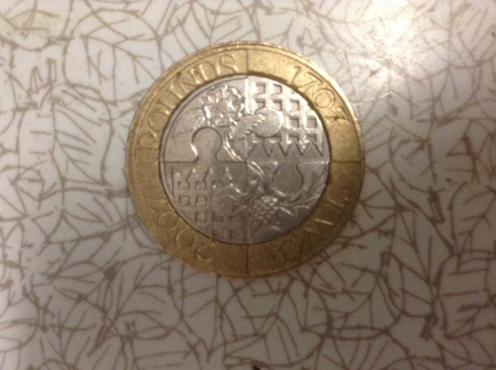 �2-Coin-Stamping-Defect.-What's-It-Worth