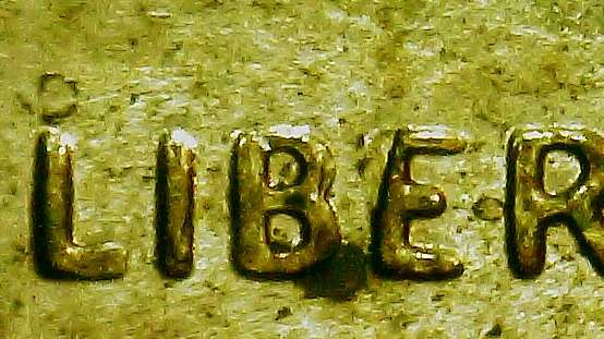 2015-D-Penny-With-A-Part-Of-The-E-Missing-In-Liberty