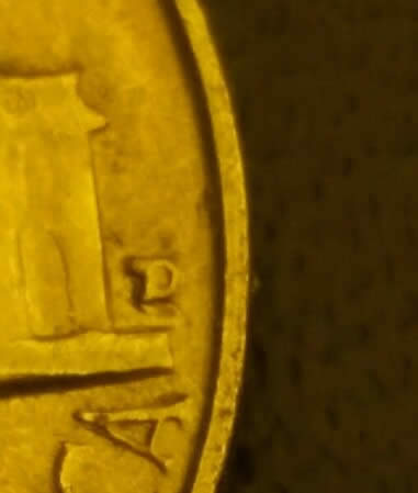 Not-Sure-If-It's-A-Mint-Mark-Over-Mimy-Mark-1958-D-5c-Jeffeson-Nickel