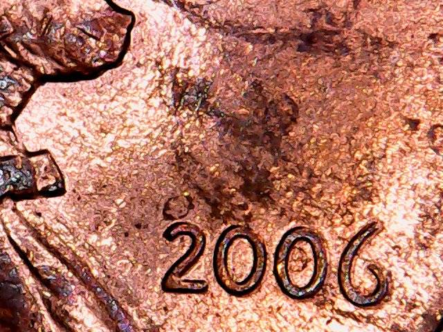 2006-Lincoln-Cent-Extra-Behind-Ear?