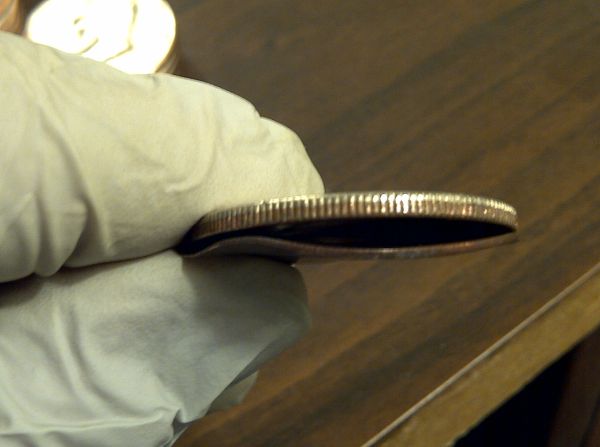 What-Strange-Things-Have-You-Found-In-Rolled-Coins?