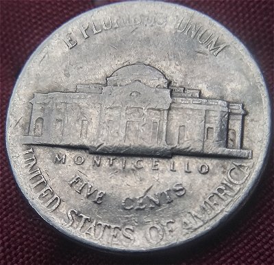 Damage-Or-Broad-Struck--1987-P-Nickel?