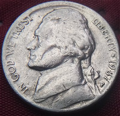 Damage-Or-Broad-Struck--1987-P-Nickel?