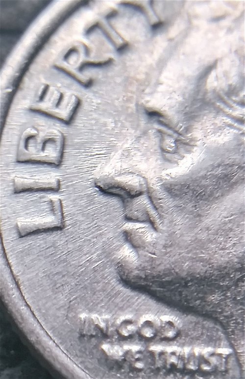 2000-P-Dime-Struck-Through-Something-With-Doubling