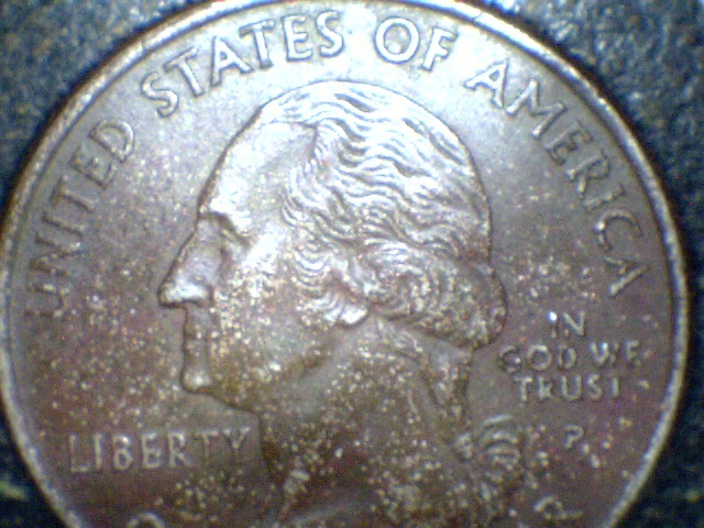 2004-Texas-Quarter.is-This-Struck-Through-Oil-Or-Missing-Clad?