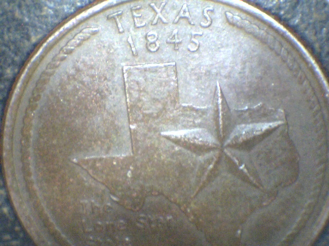 2004-Texas-Quarter.is-This-Struck-Through-Oil-Or-Missing-Clad?