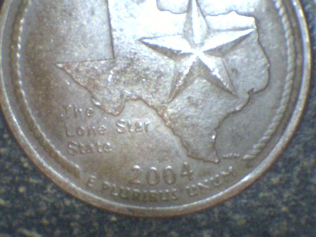 2004-Texas-Quarter.is-This-Struck-Through-Oil-Or-Missing-Clad?
