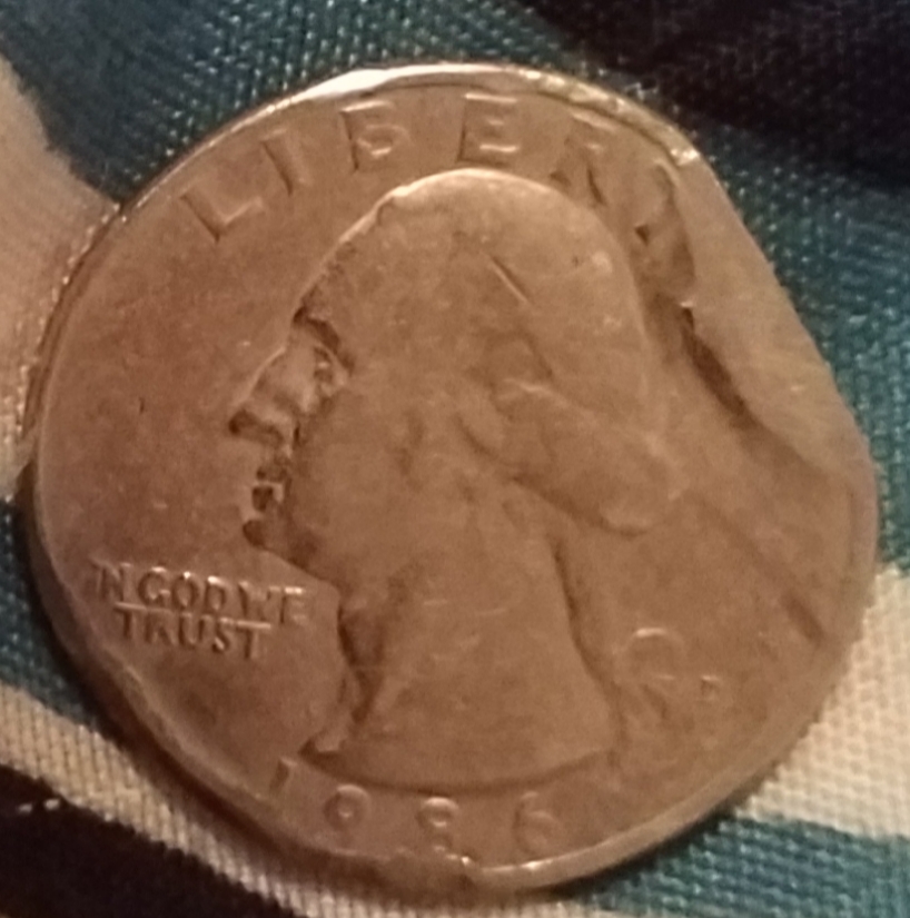 Clipped,-Melted,-Folded.-1986-D-Quarter