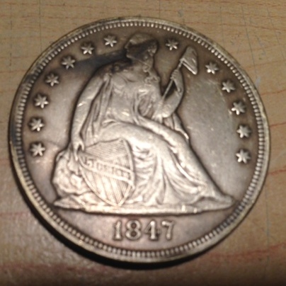 1874-Dollar-Looks-Like-The-Half.--Is-It-Fake?