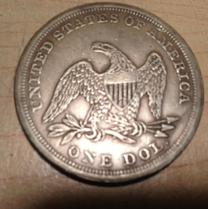 1874-Dollar-Looks-Like-The-Half.--Is-It-Fake?
