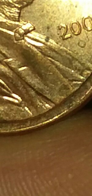 Trying-To-Figure-Out-If-This-Is-Really-A-O-Under-My-2006-Penny-Thanks