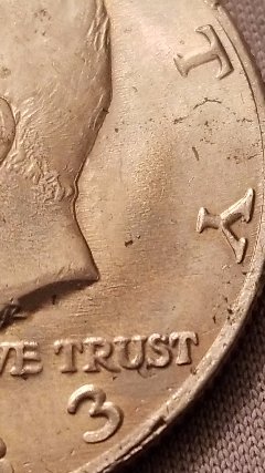 1983-Kennedy-Half-Dollar-Painted-Or-Defect?
