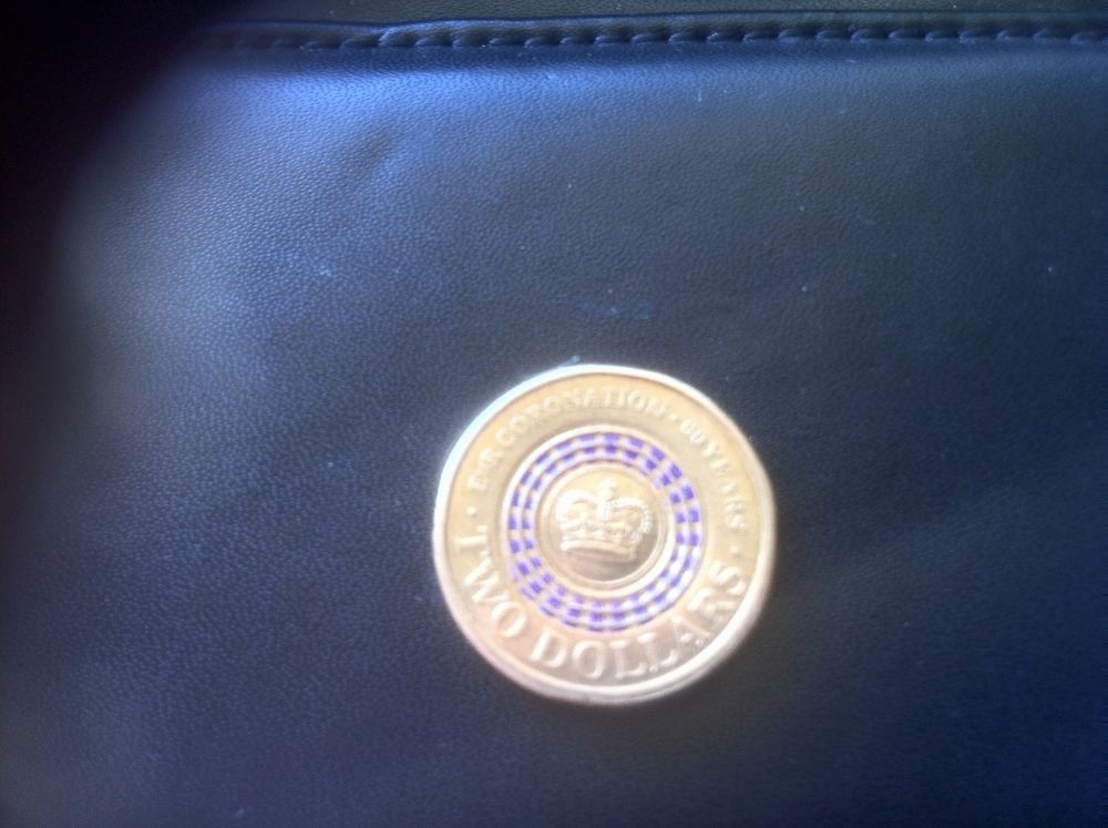 Coronation-$2-Coin--Colour-Ring-Slightly-Off-Centre