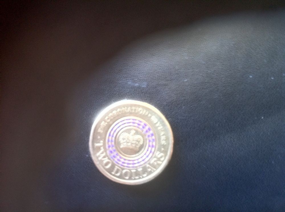 Coronation-$2-Coin--Colour-Ring-Slightly-Off-Centre