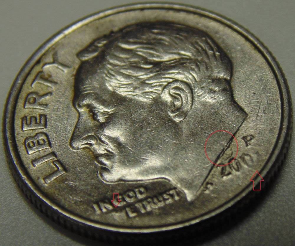 Dime-With-Issues.-Date-And-Something-With-Neck.