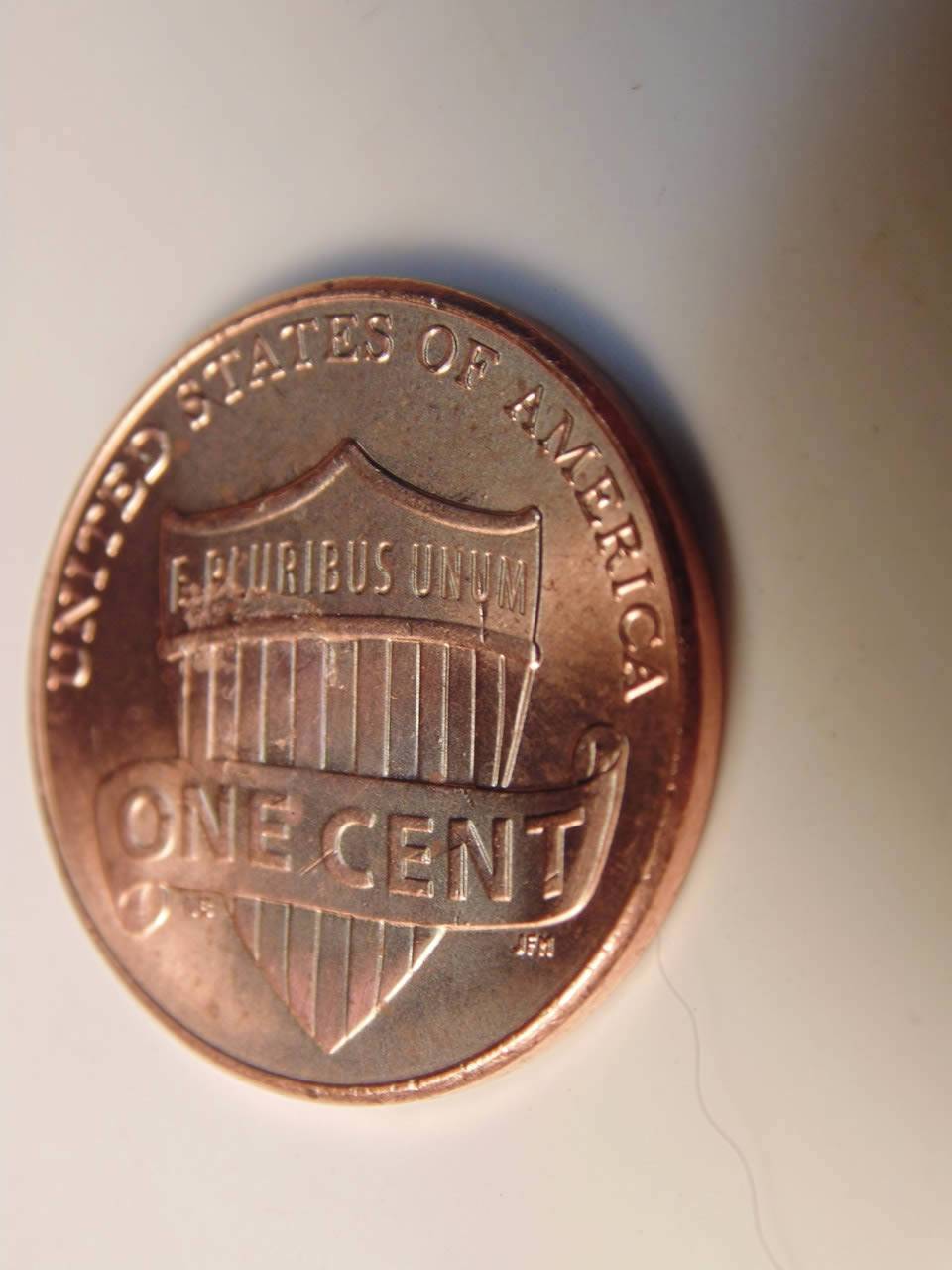 2014-Penny-With-A-Lot-Damage.