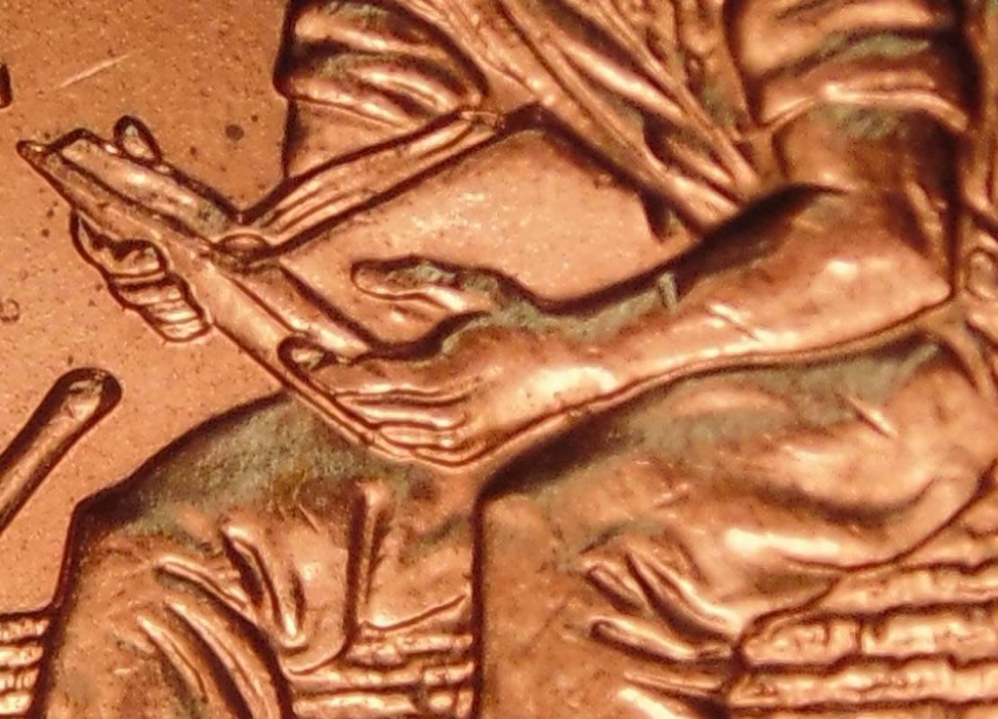 2009-Lincoln-Penny.is-This-One-Of-The-Extra-Fingers?