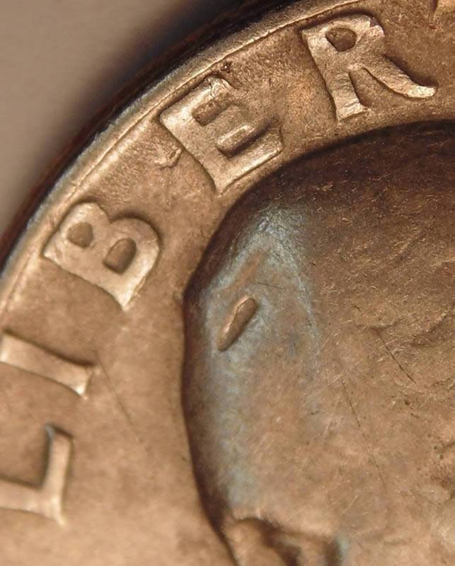 1965-Quarter-First-Struck-Thru?