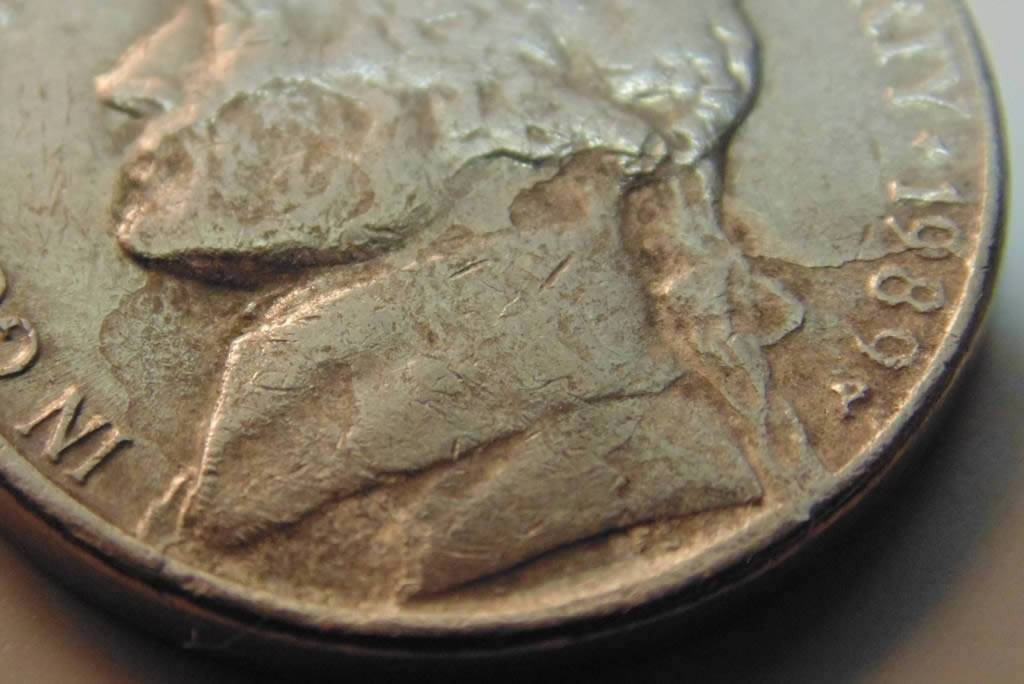 Multiple-Strike-Through-Nickel-Or-Enviro-Damage?