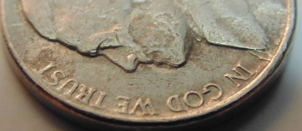 Multiple-Strike-Through-Nickel-Or-Enviro-Damage?