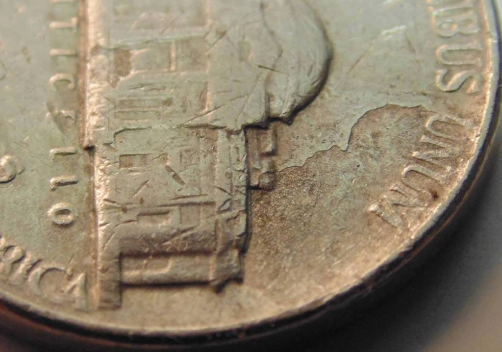 Multiple-Strike-Through-Nickel-Or-Enviro-Damage?