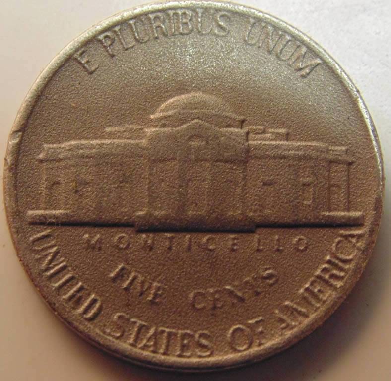 Nickel-With-What-I-Think-Is-Enviro-Damage!