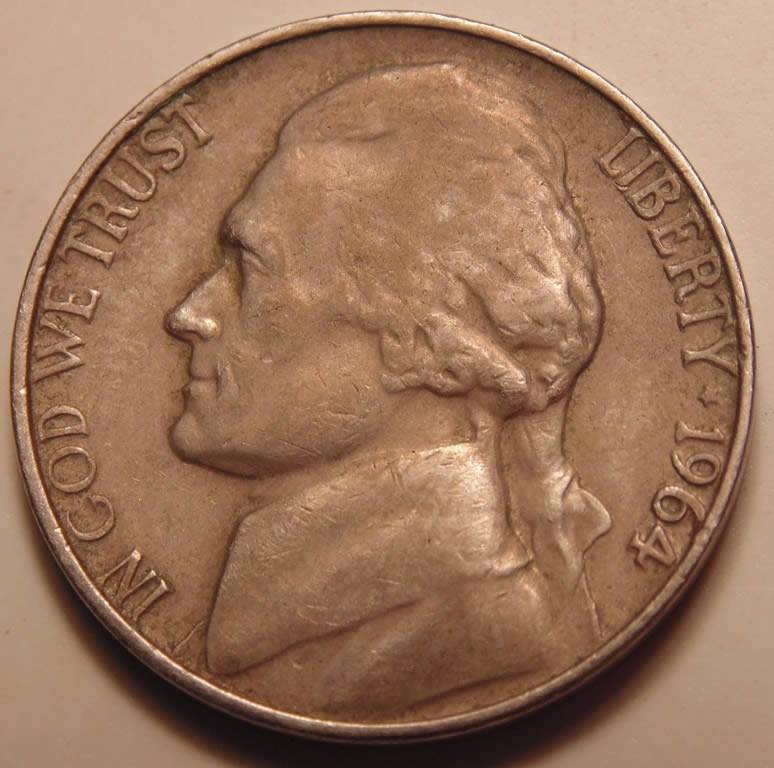 1964-Nickel.-Strike-Through,-Lam-Or-Both?