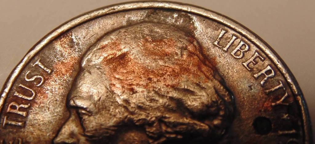 1991-D-Nickel,-Stike-Through,-Enviro,-Lam,-Or-Something-Else?