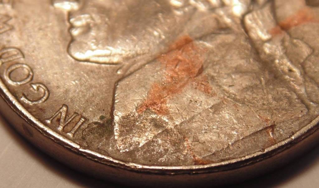 1991-D-Nickel,-Stike-Through,-Enviro,-Lam,-Or-Something-Else?