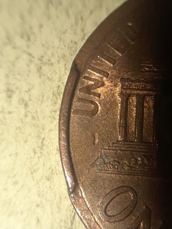 Raised-Rim-On-1998-LMC.-Left-Side-On-Reverse.