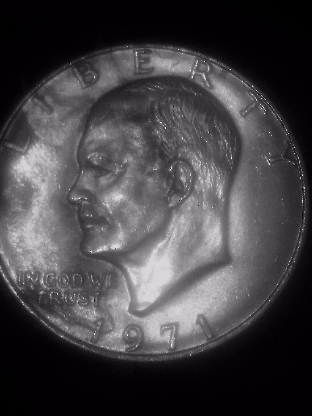 1971-Ike-Dollar-With-Something-Underneath-The-Strike?-Doubling-As-Well-Help