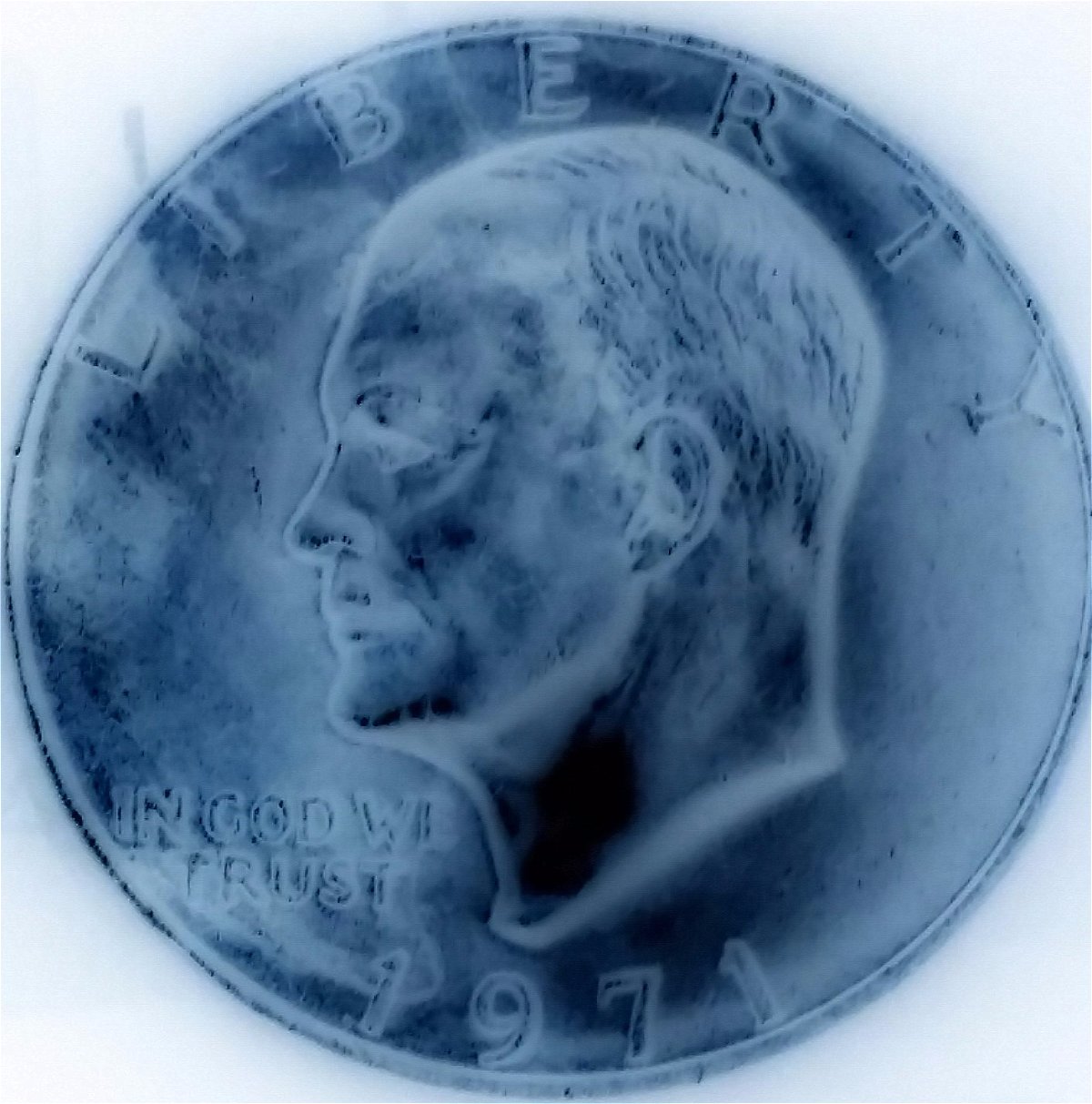 1971-Ike-Dollar-With-Something-Underneath-The-Strike?-Doubling-As-Well-Help