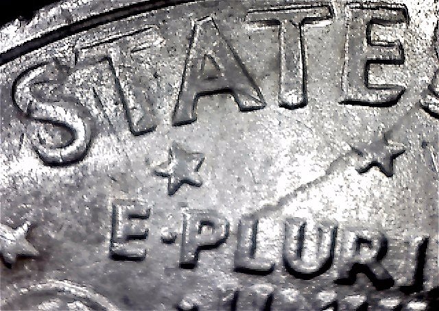 1971-Ike-Dollar-With-Something-Underneath-The-Strike?-Doubling-As-Well-Help