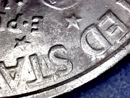 1971-Ike-Dollar-With-Something-Underneath-The-Strike?-Doubling-As-Well-Help