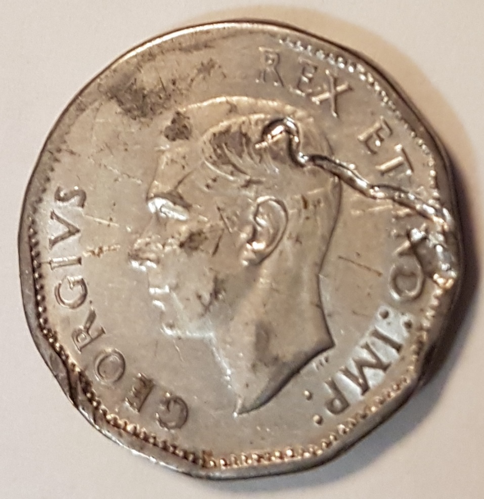 1944-Nickel-With-Multiple-Strike-Throughs?