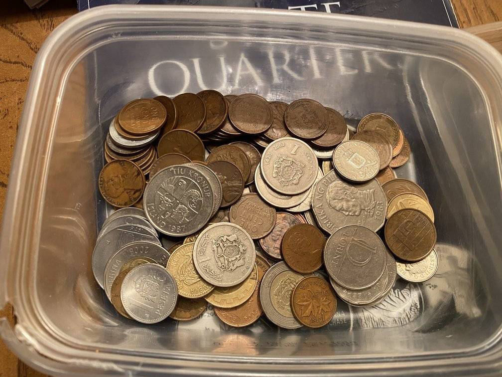 Foreign-Haul-Found-In-Cup-In-The-Trash-Next-To-The-Coinstar