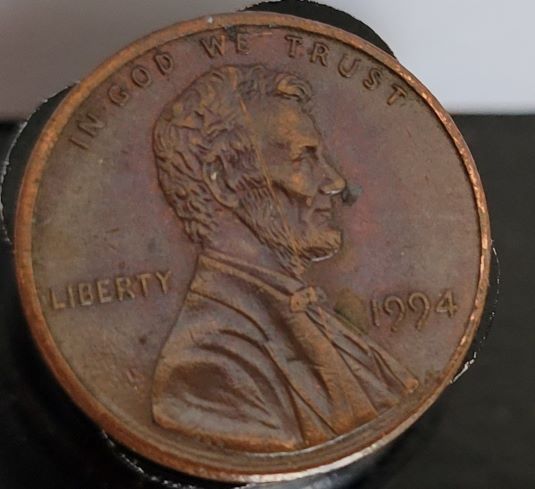 1999-Lincoln-Penny---Is-This-A-Production-Error-Or-Scratch
