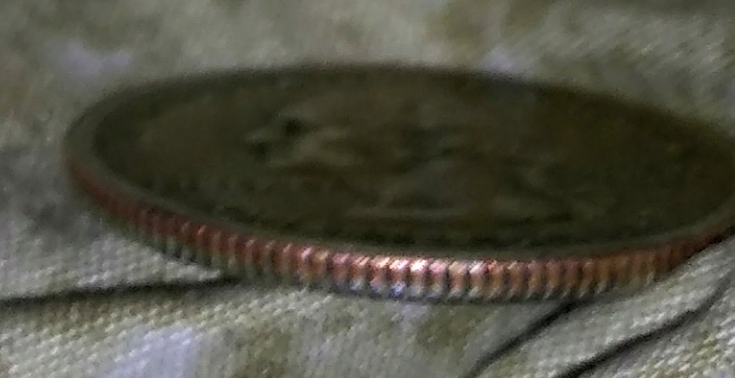 2007-Quarter-One-Side-Is-An-Odd-Color