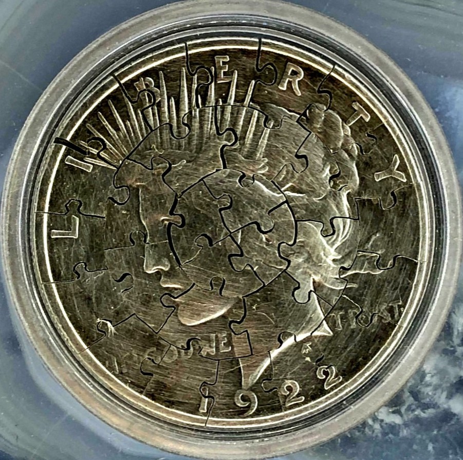 Pieces-Of-A-1922-D-Peace-Dollar