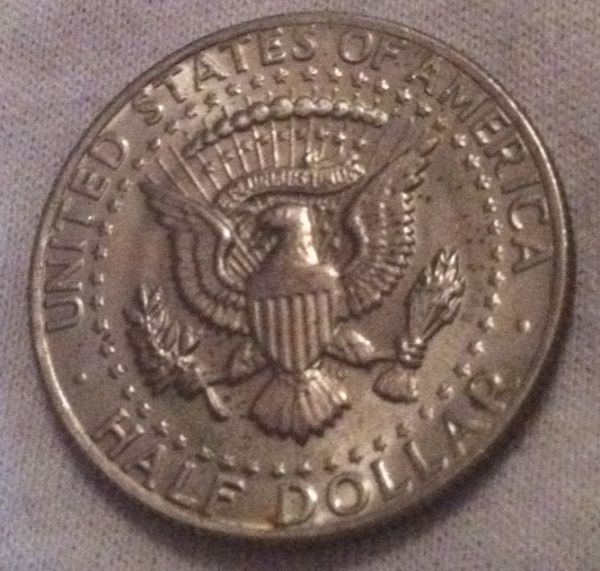 1973-Kennedy-Half....ghost-Circles?