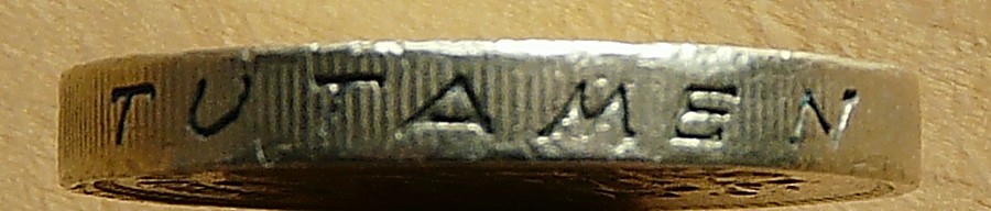 Fake-£1
