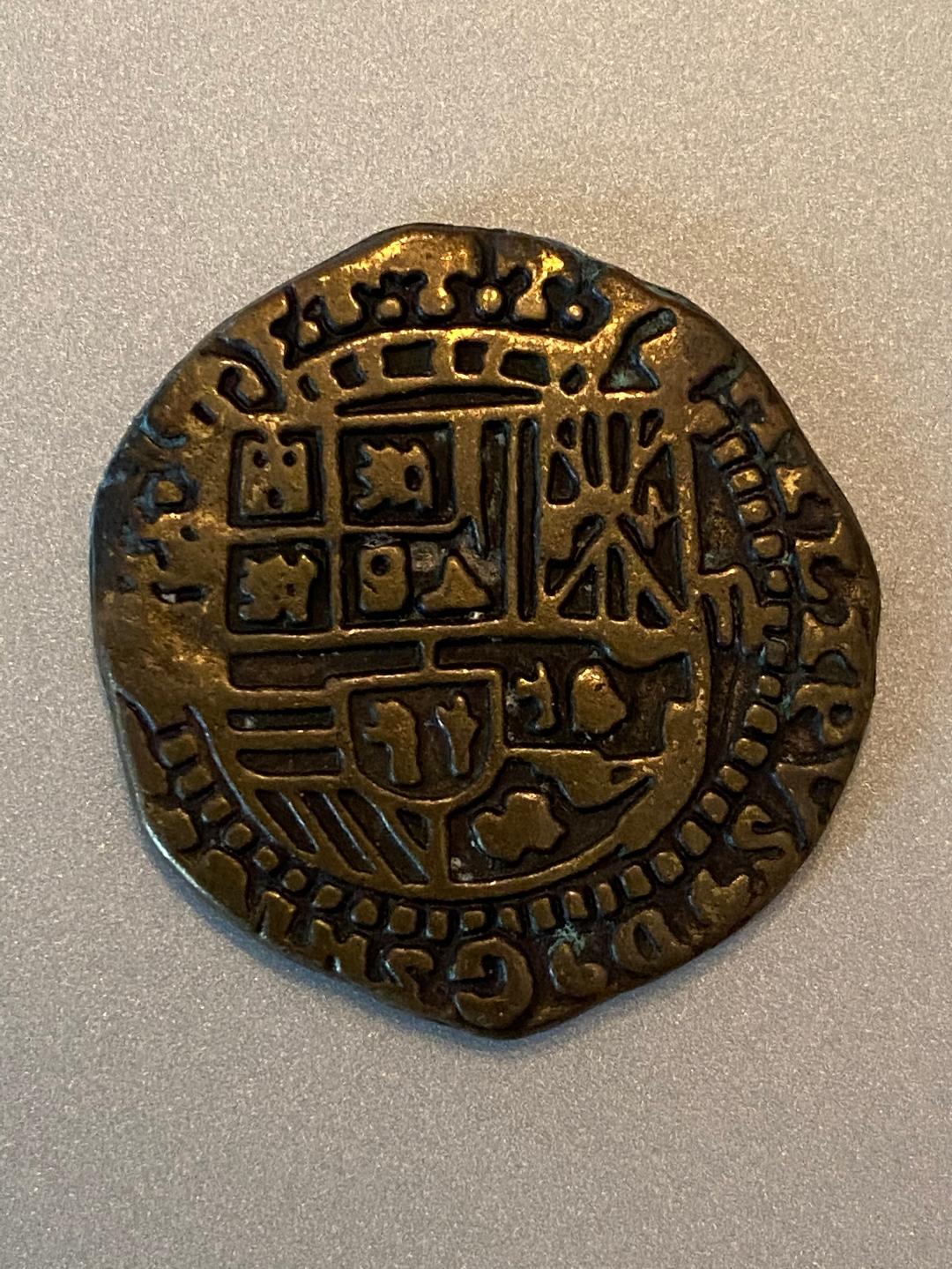 Old-Coin-Found-Sweeping-Under-Baseboards