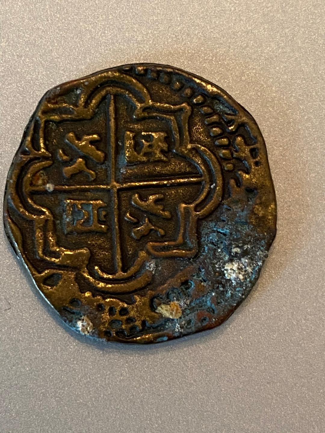 Old-Coin-Found-Sweeping-Under-Baseboards