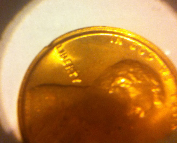 Help-1973-S-Lincoln-Cent-With-A-Excess-Rim-That-Ends-In-Ding