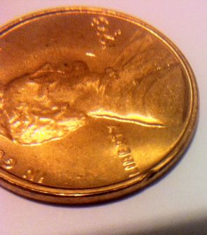 Help-1973-S-Lincoln-Cent-With-A-Excess-Rim-That-Ends-In-Ding