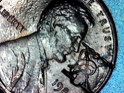 1984-P-Lincoln-Cent-With-A-Xed-Out-Santa-Stamped?